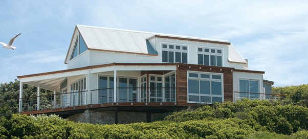 Figure 26: Timber frame house with stone cladded foundation and fibre cement and solid wood exterior cladding